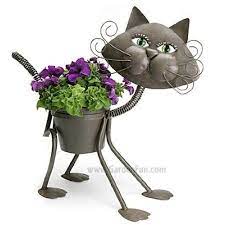 Several websites currently stock several containers, including extra large plastic planters. Large Glamour Cat Cat Indoor Or Outdoors Garden Decor Plant Stands Holds 6 Grower Pot 19 Inches Ta Metal Garden Art Animal Planters Metal Art Projects