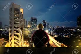 We did not find results for: Traveler Man Sitting On The Top Of Building Looking At The City Stock Photo Picture And Royalty Free Image Image 39565501