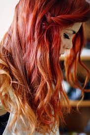 Multicolored hair with blonde and electric red highlights Red Hair Color Ideas Red Ombre Hair Ombre Hair Blonde Hair Styles