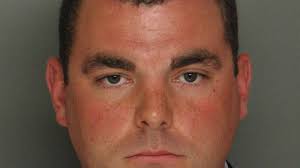 White officer now faces felony charge for fatally shooting a black man in  his driveway