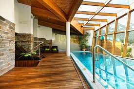 Almost any water feature can be installed in indoor or outdoor swimming pool design. Indoor Pool Vs Outdoor Pool Poolfyi