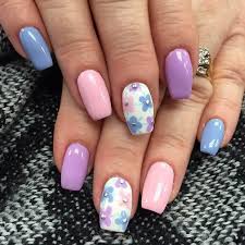 Whether done freehand with a brush or with the help of stamps, a floral effect is surprisingly easy — and always lovely. 50 Flower Nail Designs You Can Totally Pull Off In 2021