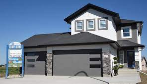 boychuk homes presents its newest showhome an 1891 sq ft two story with a walk out basement backing onto a linear park and onl storey homes manor show home