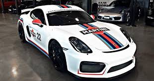 Porsche Cayman Gt4 Looks Spot On With Martini Racing Stripes Carscoops Martini Racing Martini Racing Stripes Cayman Gt4