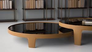 Two hidden drawers and an open shelf provide ample storage for neat organization. Hoop Coffee Table By Marcelo Ligieri Nesting Optional Kelly Christian Designs