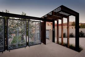 Different Materials For Modern Entrance Gate Designs Unique Glass Entrance Gate Designs For Modern Luxury House Ideas Using Nice Plants