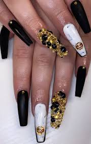 Black nail paint with goldish yellow hint provides a remarkable glam to your hands. Stylish Nail Art Design Ideas To Wear In 2021 Coco Chanel Inspired Nails