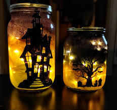 I Painted Old Glass Jars And Made These Halloween Inspired Lanterns With Led Lights Inside Crafts With Glass Jars Glass Jars Diy Glass Jar Lamps