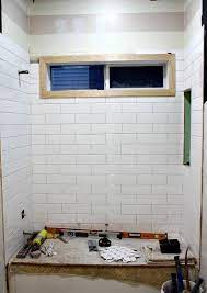 This tile is white and has a polished or high gloss finish, making it an excellent addition for your style and space. Big Box Bathroom Day 2 Bathrooms Remodel Bathroom Wall Tile Bathroom Remodel Master