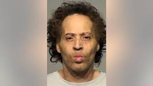 Two charged in beating death of 49-year-old Curtis Scott