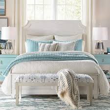 A beautiful vintage modern bedroom set that includes a low dresser, highboy dresser, and two nightstands. Bedroom Furniture Collections Bassett Furniture