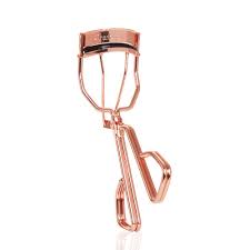 While your eye is open, open the curler. Life Changing Lashes Rose Gold Eyelash Curler Charlotte Tilbury