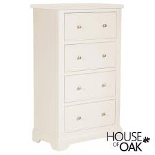 The tall white dresser has functional capabilities such as storing clothing items and other accessories in your bedroom. Symphony White 4 Drawer Tall Chest Of Drawers House Of Oak
