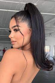 Cool Girl Tendrils Are The Relaxed Style That S All Over Instagram Hair Ponytail Styles Slick Hairstyles Curly Hair Styles