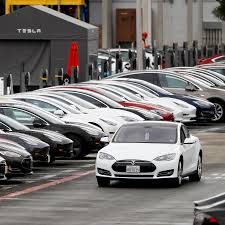 Electric cars, giant batteries and solar. Tesla Shines During The Pandemic As Other Automakers Struggle The New York Times