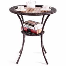 The brown color is neutral to complement most existing furniture. Round Rattan Wicker Glass Top Steel Frame Coffee Table