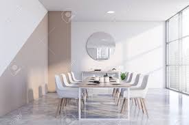 See more ideas about beige dining room, home decor, dining room sets. Interior Of Modern Dining Room With White And Beige Walls Concrete Stock Photo Picture And Royalty Free Image Image 138088237