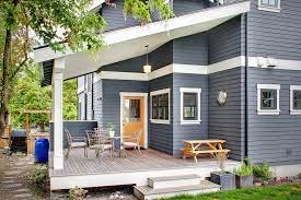 Black paint highlights window sashes and dentil moldings running across window and door trim. Green Lake Classic Craftsman Traditional Deck Seattle By Rw Anderson Homes Houzz
