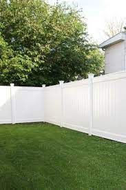 Our New White Vinyl Fence Before After The Diy Playbook White Vinyl Fence Vinyl Fence Landscaping Vinyl Fence