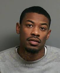 Two charged in New Year's Eve robbery of Sterling Heights store