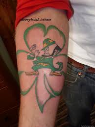 These designs turn and twist within itself to create a wonderful pattern. Fighting Irish Leprechaun And Clover Tattoo On Arm Tattoo Ideas Best Tattoo
