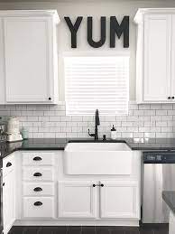 It looks classic and 70s. Black White And Teal Kitchen Farmhouse Sink Source Lollipopsandlightsabers Black And White Modern Kitchen White Kitchen Design Kitchen Design Decor