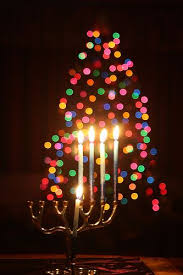 Love The Combination Of The Hanukiah Menorah For Hanukkah With The Bright Bokeh Of Christmas Tree Lights Festival Lights Holiday Lights Christmas Tree Lighting