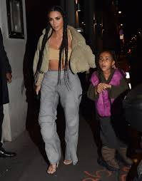 Whatever the true answer is, it is clear that kim sometimes embraces the yeezy look too much; Kim Kardashian Layers Nude Tones At Yeezy S Paris Fashion Week Show Footwear News