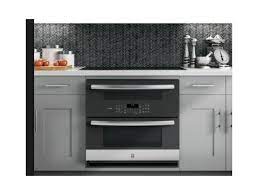 Allow ⁵⁄₈ (1.6 cm) for oven trim to overlap on each side. Induction Cooktop Wall Oven Underneath And Downdraft Hood In Island