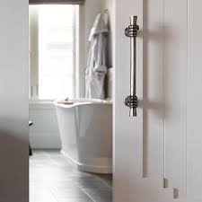 Sliding barn doors can make any space feel welcoming and cozy and this includes the bathroom. Mirrored Bathroom Door Design Ideas