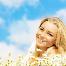 Beautiful woman enjoying daisy field and blue sky Photograph by Anna Om