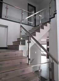 Glass staircase enclosures serve as a stylish addition to modern and minimalist interiors. Glass Staircase Railing Houzz