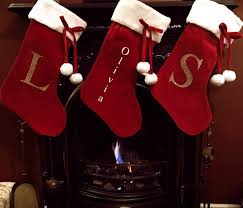 This plush velvet stocking has tree shapes embroidered onto the surface and is perfect for all those little extra christmas gifts. Luxury Velvet Christmas Stocking Personalised Oh Flora