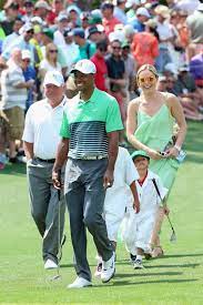 Tiger Woods Brings Lindsey Vonn And His Kids Along For A Cute Round Of Golf Tiger Woods Golf Fashion Mens Golf Fashion