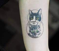 two cats tattoo by jefree naderali post 24212 tattoos cat tattoo first tattoo