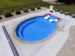 Meet Our Gem Of A Fiberglass Pool Pearl She Ll Snug In Perfectly To Just About Any Size Backyard A In 2020 Pool Installation Fiberglass Pools Backyard Pool Designs