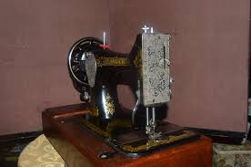 Image result for singer 28k