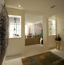 Glass Display Shelves That Open Up The Space Between Two Rooms Home Building Design Living Room Designs Living Room Partition Design