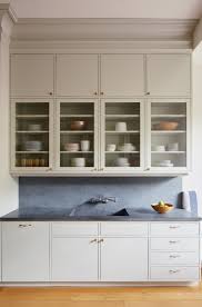If you have the right tools and the proper typically, 20 inches of space is needed between the kitchen countertop and the bottom part of the upper cabinets. Remodeling 101 What To Know About Installing Kitchen Cabinets And Drawers Remodelista