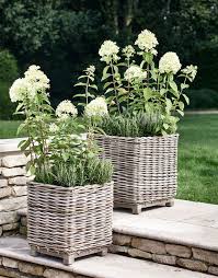 Check spelling or type a new query. Two Square Rattan Planters