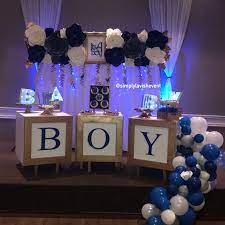 It S A Boy Baby Shower Setup Royal Blue Grey And White Paper Flower Backdrop Follow Us Simplylavi Baby Shower Candy Table Baby Shower Candy Baby Boy Shower