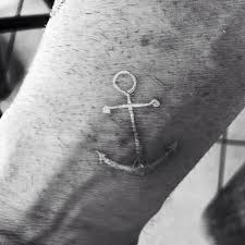 Discover a sea of masculine ideas with these anchor tattoos for men. Wonderful Classy Anchor Tattoo Design Image Made By Black And White Ink
