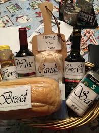 If nothing else, this gift will certainly be a great conversation piece over dinner. Housewarming Bread Wine Olive Oil Honey Salt Candle House Warming Gifts Homemade Gifts For Mom Traditional Housewarming Gifts