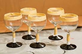 Wedding bridesmaids diy diy painted glasses paintedwineglasses2/ like to use wine ,martini and wide mouth glasses to hold flower balls. Diy Santa Wine Glasses Entertaining Diva From House To Home
