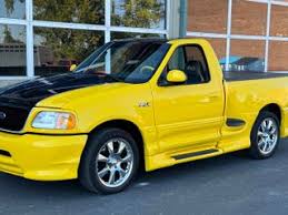 Image result for Federal Safety Yellow 2002 Truck