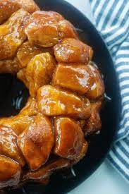 Roll in cinnamon and sugar that has been mixed together. Ooey Gooey Monkey Bread Recipe Buns In My Oven