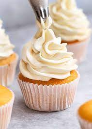 Mix thoroughly, stopping once the frosting reaches the stiffness you desire. My Secret Less Sweet Fluffy Vanilla Frosting Recipetin Eats