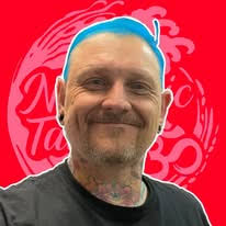 What are good places or artists for tattoos in Loveland?