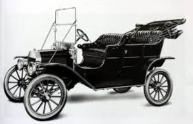 The Model T Colloquially Known As The Tin Lizzie Is Generally Regarded As The First Affordable Car In The World Ford Models Ford Motor Company Ford Motor