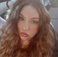 What are some support groups or therapy resources in the Grand Rapids area  for someone without health insurance?